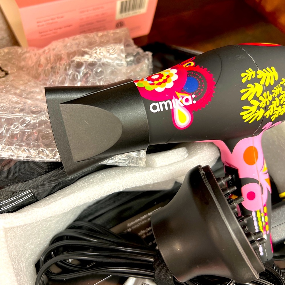 Amika travel hair dryer with attachments